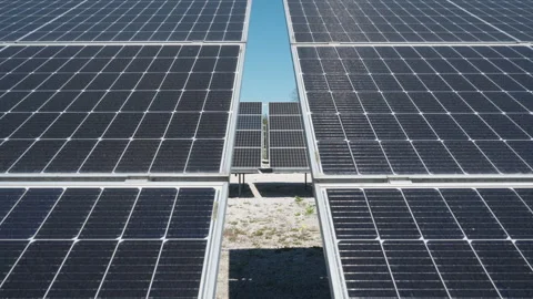 Rows of solar panel array at large industrial photovoltaic power plant Stock Footage 334389342