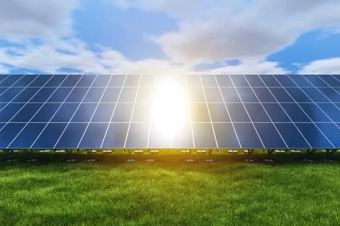 Rows of solar panels in a field on a background of green grass. Ground powe.. Stock Photos