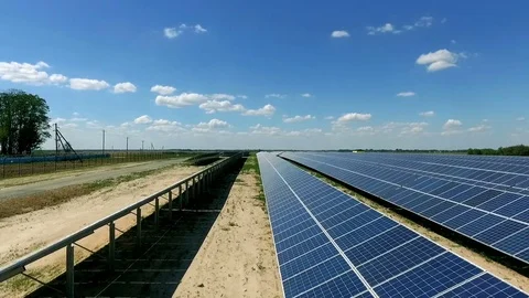 Rows of solar panels in the Solar Farm Stock Footage 72297750