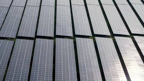 Rows of solar panels stretch under bright sun Stock Footage 339847636