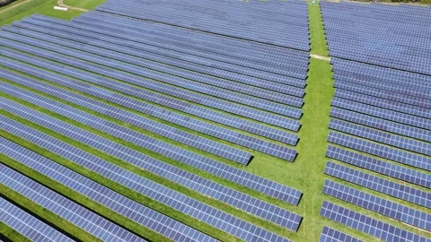 Rows of Solar Panels at a Uk Solar Farm Green Renewable Energy Stock Footage 194172672