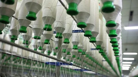 Rows of spindles in a textile mill Stock Footage 74190161