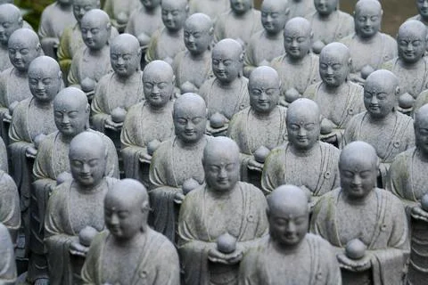 Rows of Stone Buddha Statues Stock Photos