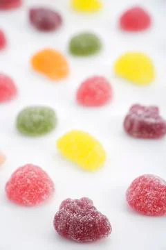 Rows of sugared gum drops on paper Stock Photos
