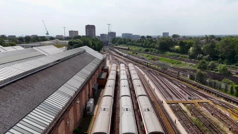 Rows of Underground Carriages in the Sidings at Ealing Common Depot Stock Footage 343473175
