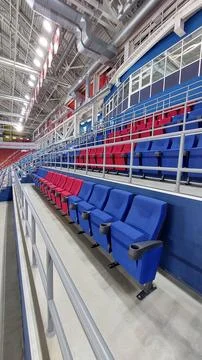 Rows of upholstered seats in the stadium Stock Photos