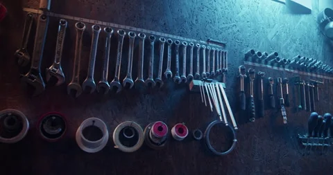 Rows of various tools organized in garage Stock Footage 259394628