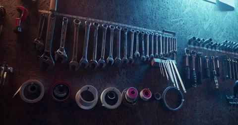 Rows of various tools organized in garage Video stock 259395385
