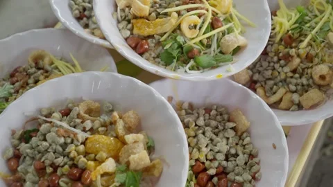 Rows of Vietnamese salad bowls with peanuts and herbs in Hue, 4K Stock-Footage 341552396