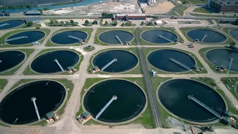 Rows of Waster water treatment tanks and sewerage treatment plant in Detroi.. Stock Footage 325835451