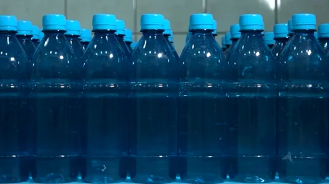 Rows of water bottles. Video stock 68984714