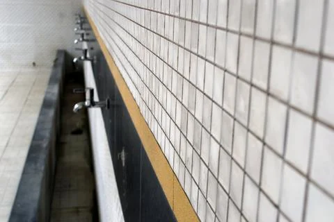 Rows of water taps with artistic camera angles Stock Photos