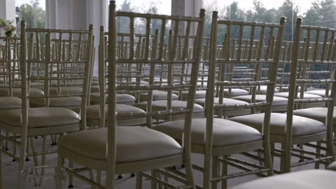 Rows of wedding chairs inside gimbal Stock Footage 170383928