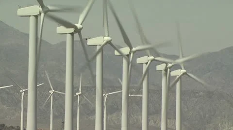Rows of Wind Turbines With Mountains In The Background 動画素材 19170775