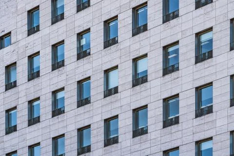 Rows of windows of an office building Stock Photos
