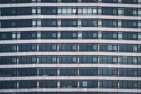 Rows of windows of an urban building Stock Photos