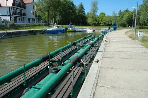 Rowy, Poland - May 25, 2014: Small fishing vessels and boats in harbour in Ro Stock Photos