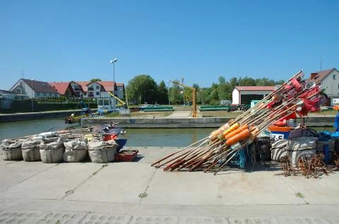 Rowy, Poland - May 25, 2014: Fishing buoys and bags containing fishing nets i Stock Photos