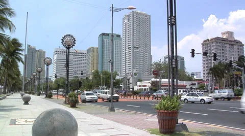 Roxas Boulevard and the High Rising Buildings of Malate Manila Philippines Stock Footage 38604541