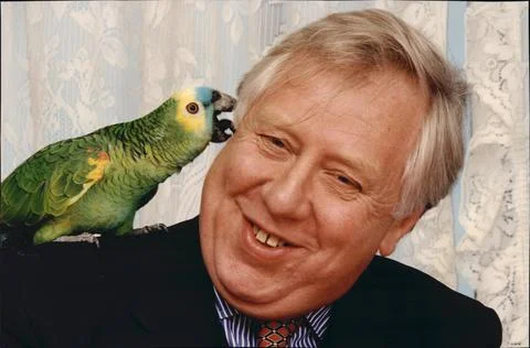 Roy Hattersley With Billy A Blue-front Amazon Parrot Contender For Britain's Cle Stock Photos