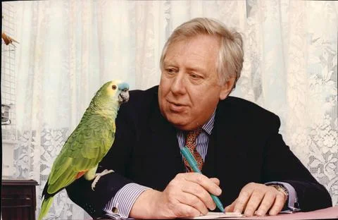 Roy Hattersley With Billy A Blue-front Amazon Parrot Contender For Britain's Cle Stock Photos