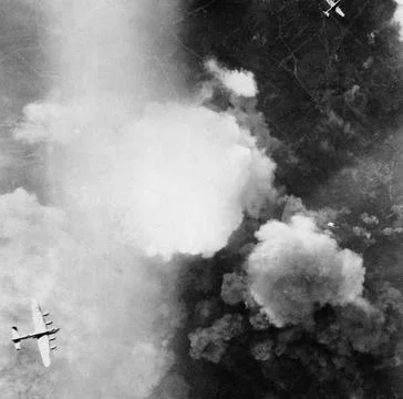 Royal Air Force Bomber Command, 1942-1945. An Avro Lancaster (bottom left)... Stock Photos