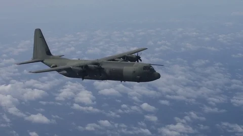 Royal Air Force C-130 Hercules in flight Stock Footage 90118892