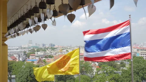 Royal and Buddhist flags fluttering over Bangkok, Thailand Stock Footage 99131498