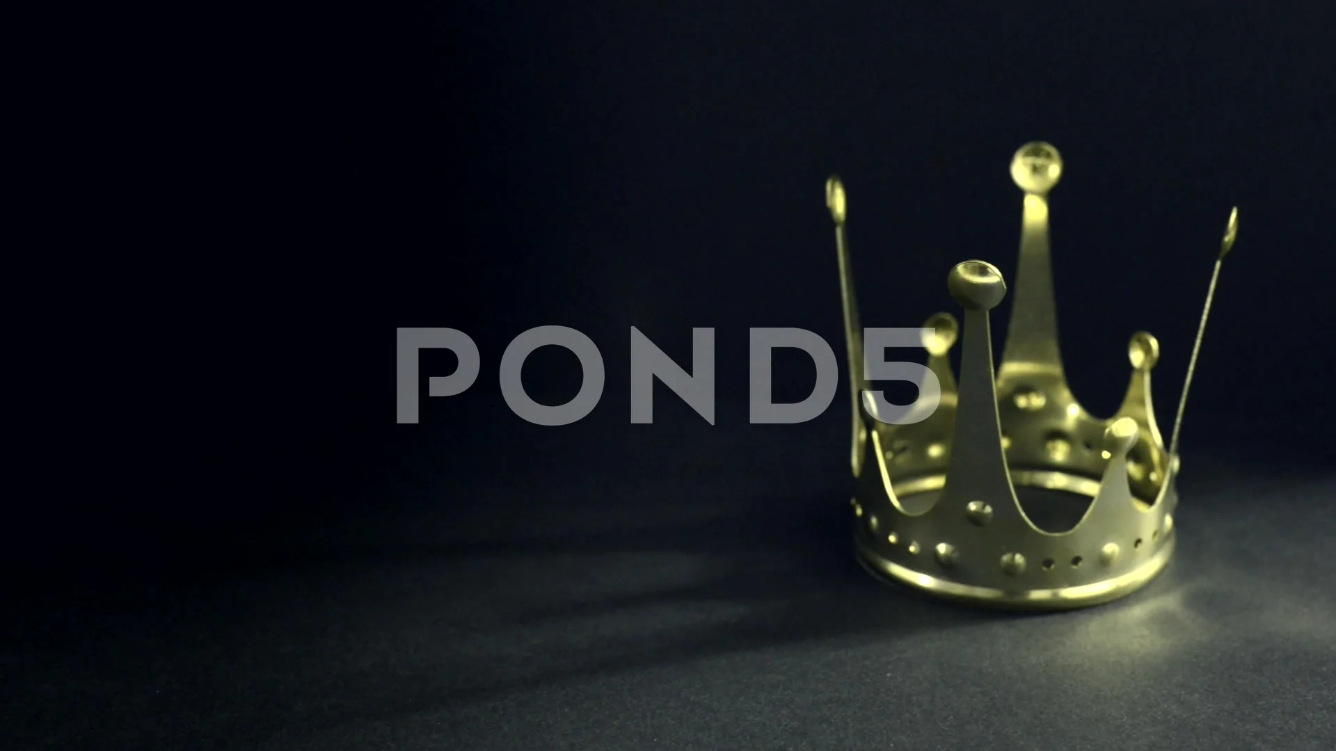 Royal gold crown on black background | Stock Video | Pond5