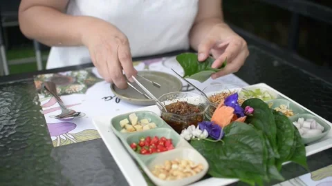 A royal leaf wrap appetizer Stock Footage 159421968