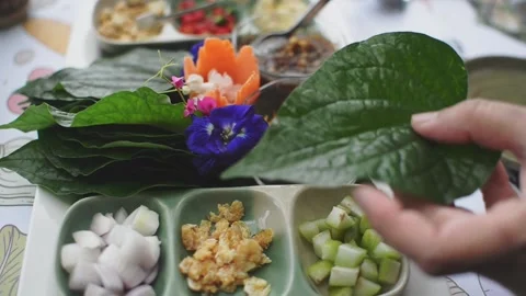 A royal leaf wrap appetizer Stock Footage 159967087