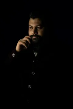 Royal looking beard man setting his mustache Stock Photos