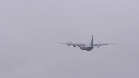 Royal norwegian air force lockheed martin c 130j super hercules climbs into Stock Footage 328209833