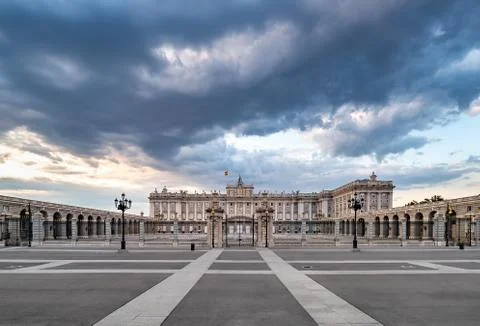 Royal palace in Madrid, at the sunset with dramatic sky and no people around. 库存照片