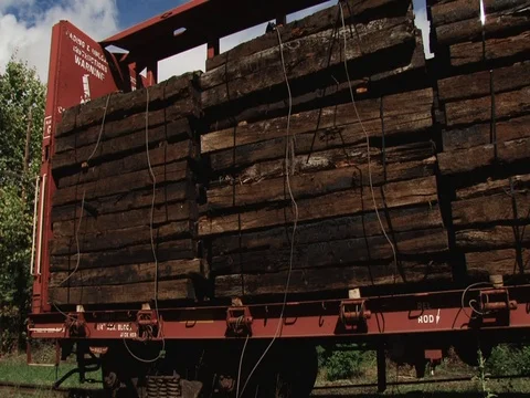 RR removal - pan carloads of removed ties Stock Footage