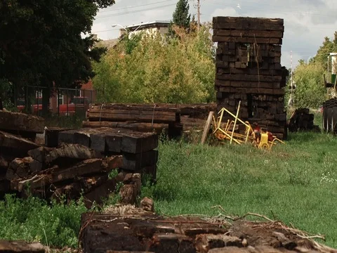 RR removal - several stacks of ties - long zoom out Stock Footage 74175950