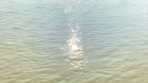 Rreflecting sunset in the background.  Padma river Stock Footage 285714645