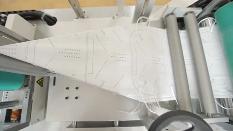 Рrotective mask bending process Stock Footage 138527140