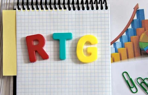 RTG (Real-time guaranteed) - acronym in multi-colored letters lies on the not Stock Photos