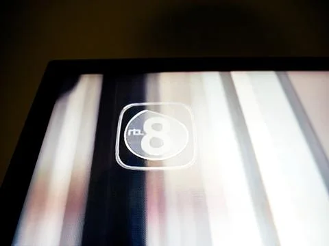 RTL 8 logo on television screen Stock Photos