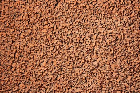 Rubber crumb with a dark-colored texture Stock Photos
