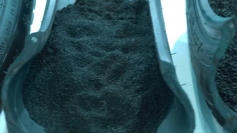 Rubber crumb (granulate) of various sizes obtained by grinding used car tires Vidéo 330901864