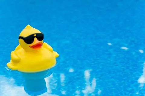 Rubber duck on blue Stock Photos