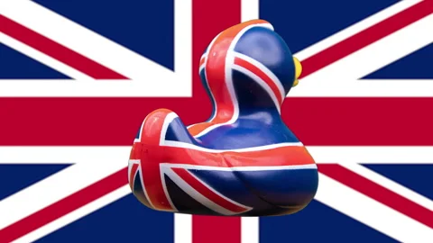 Rubber duck with Union Jack flag Stock Footage 146614149