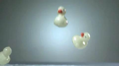 Rubber ducks fall in slow motion. Stock Footage 11612191