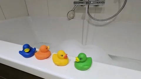 Rubber ducks waiting for their bath. Stock Footage 293410872