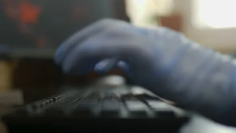 Rubber-gloved hands typing on keyboard, prevent virus spreading Stock Footage 147594340