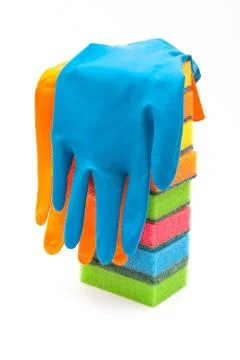 Rubber gloves and kitchen Stock Photos