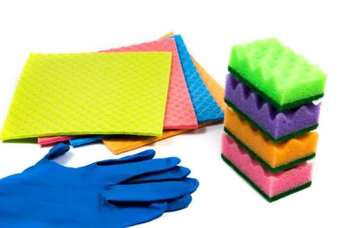 Rubber gloves, cellulose sponges, stack of cleaning sponges ready for household Stock Photos