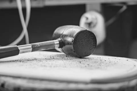 Rubber hammer on the table in the workshop Stock Photos